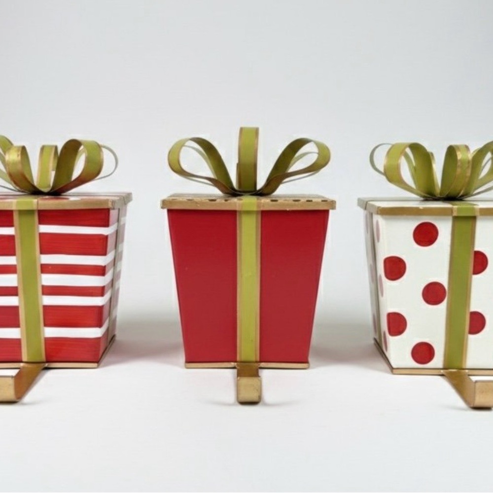 Christmas Set of three festive gift box stocking holders. Features red and white
